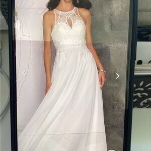 Dave and Johnny 10549 ivory bridal dress, size 6.
